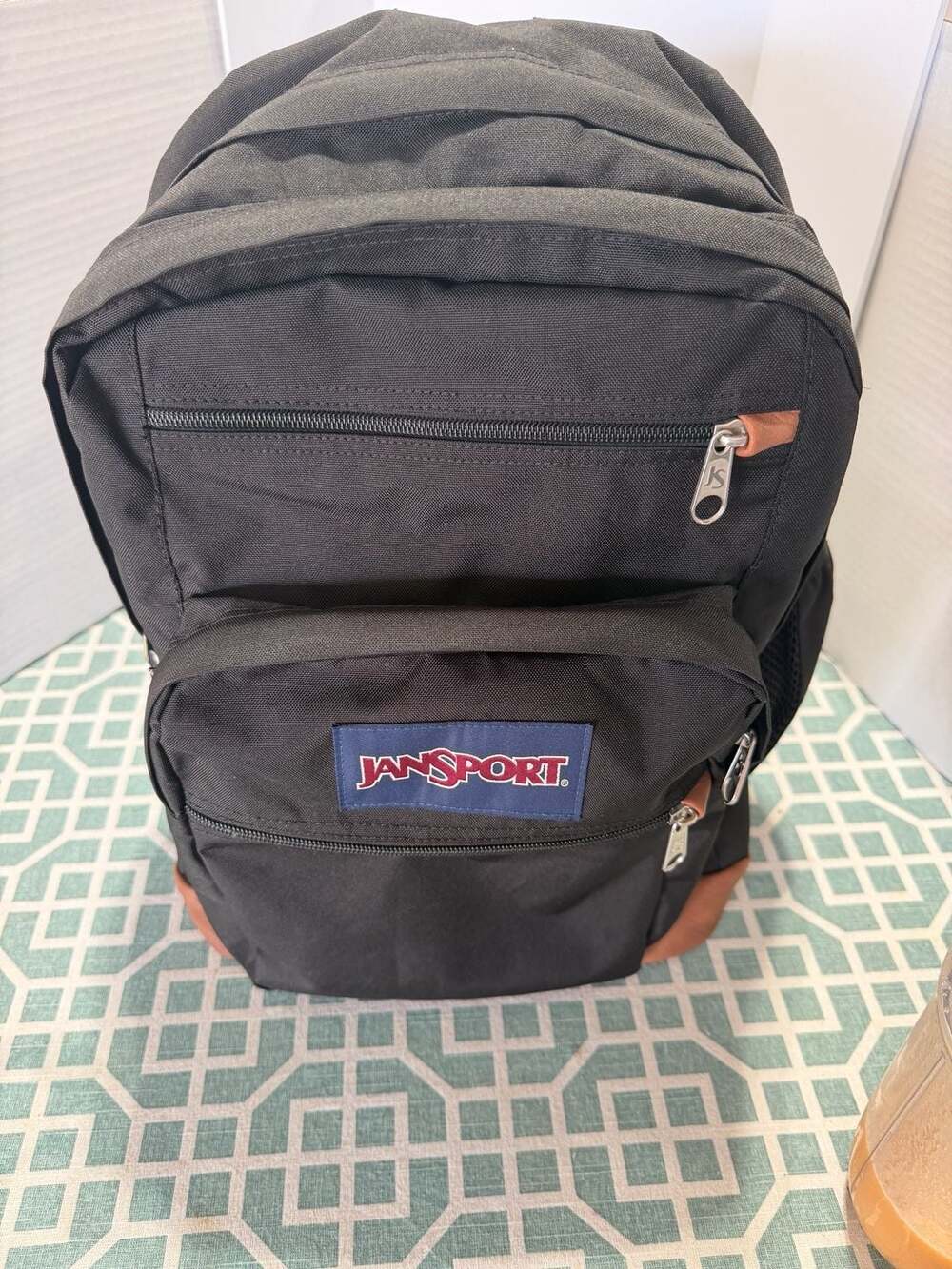 JanSport Black Backpack Brown Synthetic Leather Bottom